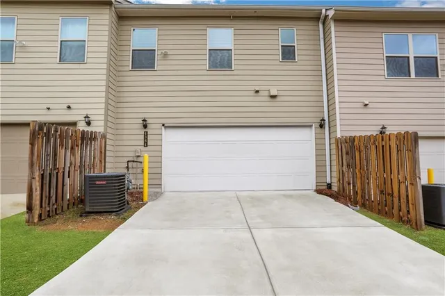 a view of a park with swings and slides