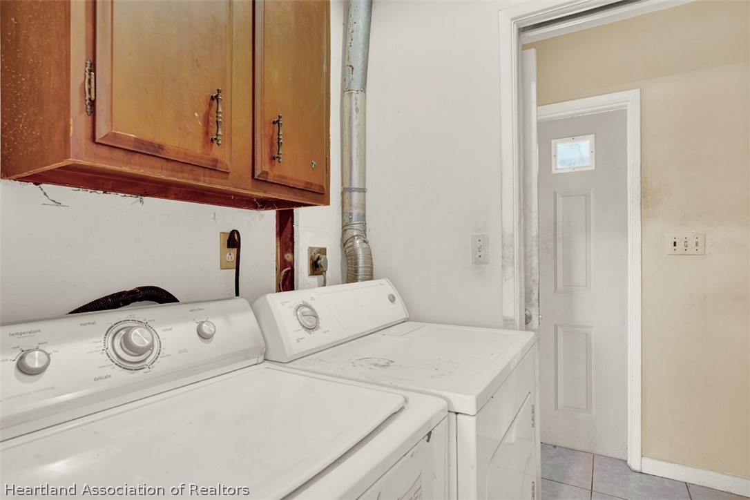 3204 Golfview Road Sebring, FL 33875 - Photo 14 of 36 a utility room with dryer and washer