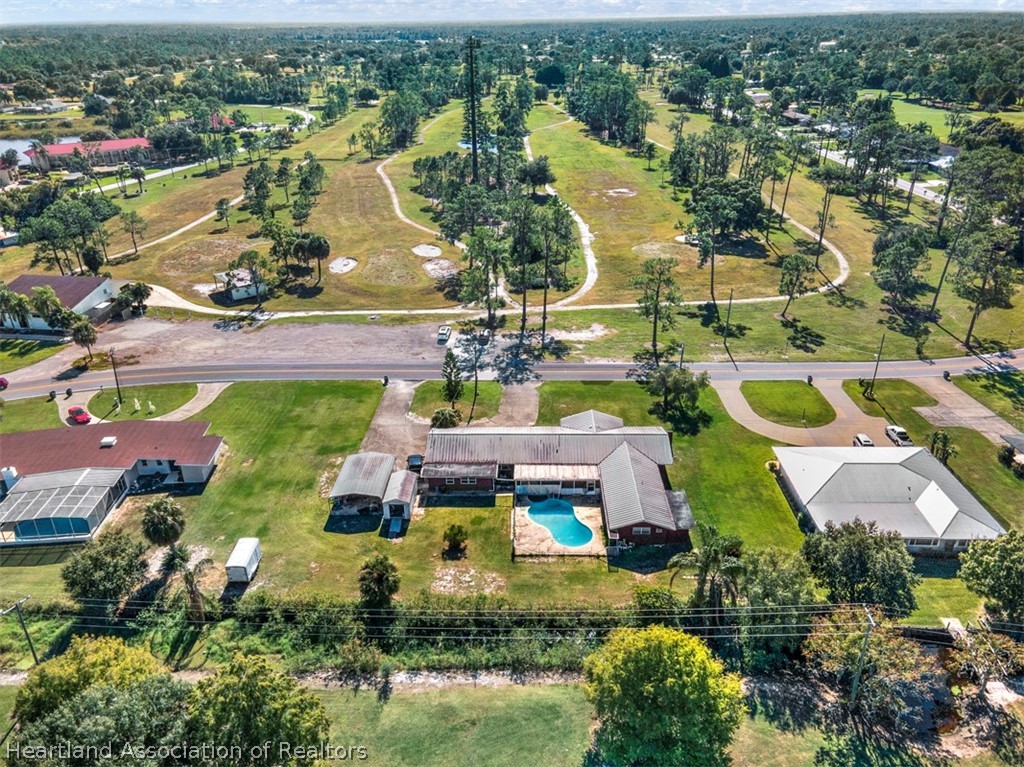 3204 Golfview Road Sebring, FL 33875 - Photo 3 of 36 an aerial view of residential houses with outdoor space