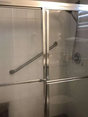 a bathroom with a glass shower