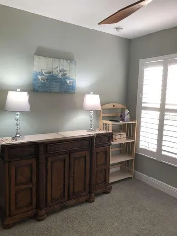 a kitchen with stainless steel appliances a stove and cabinets