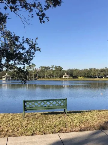 a view of living room with furniture and rug