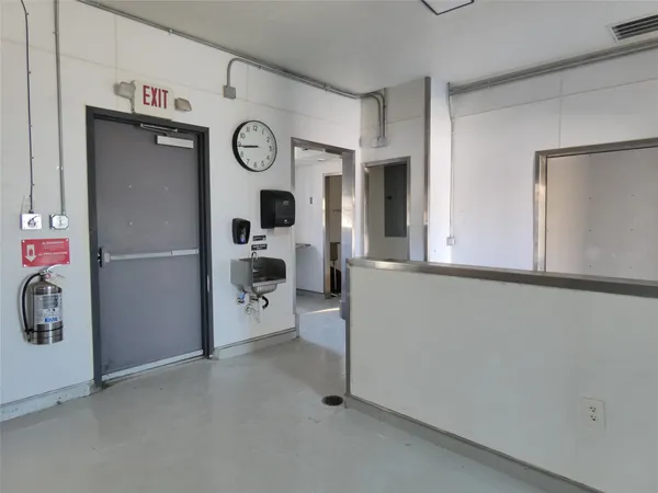 a view of storage and utility room with washer and dryer