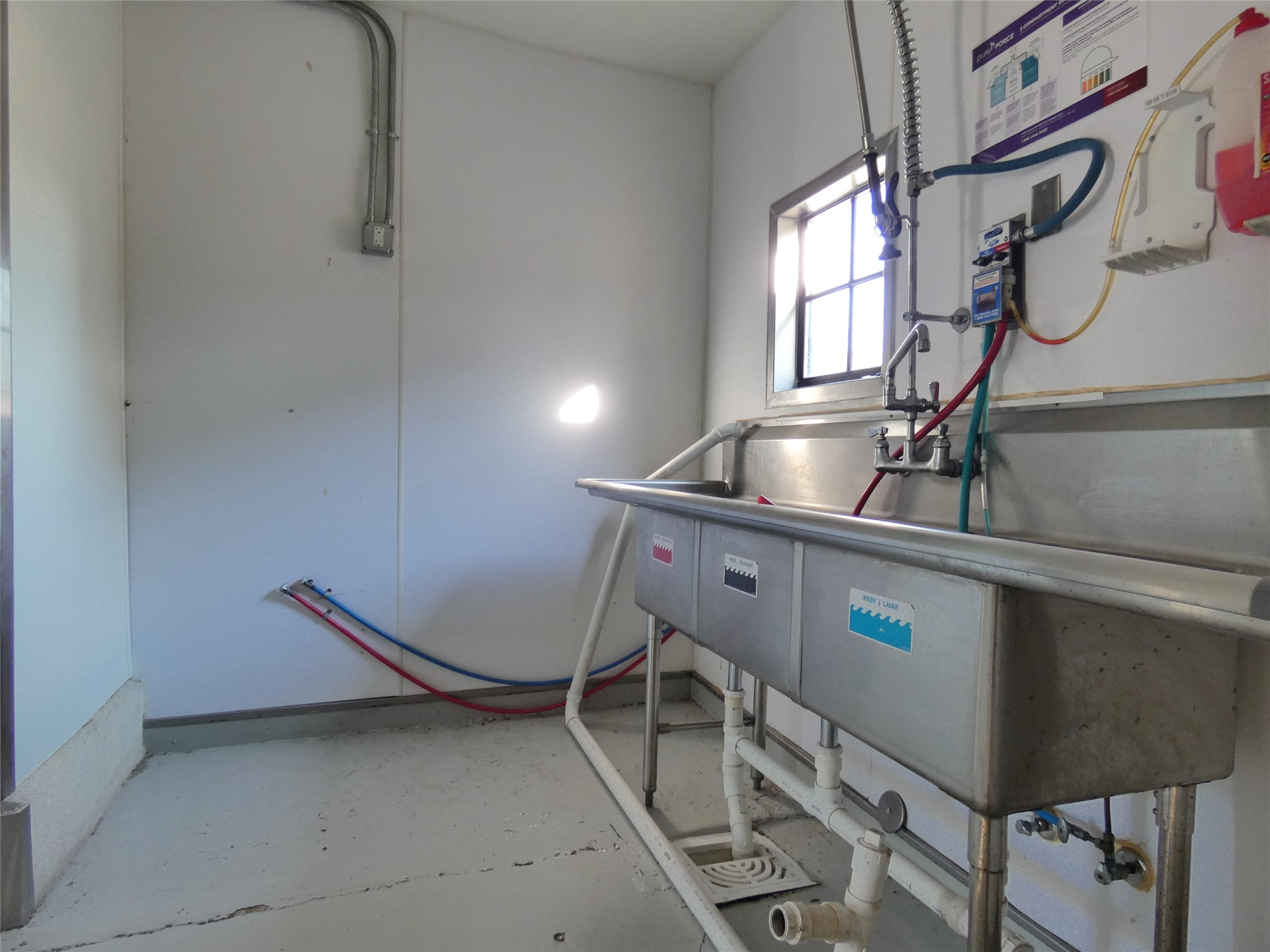 1704 Avenue D Rosenberg, TX 77471 - Photo 18 of 27 a room with gym equipment and wooden floor