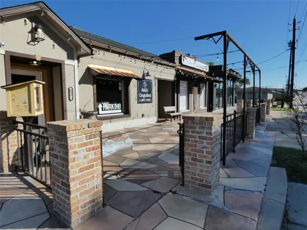 a view of a building with sitting area