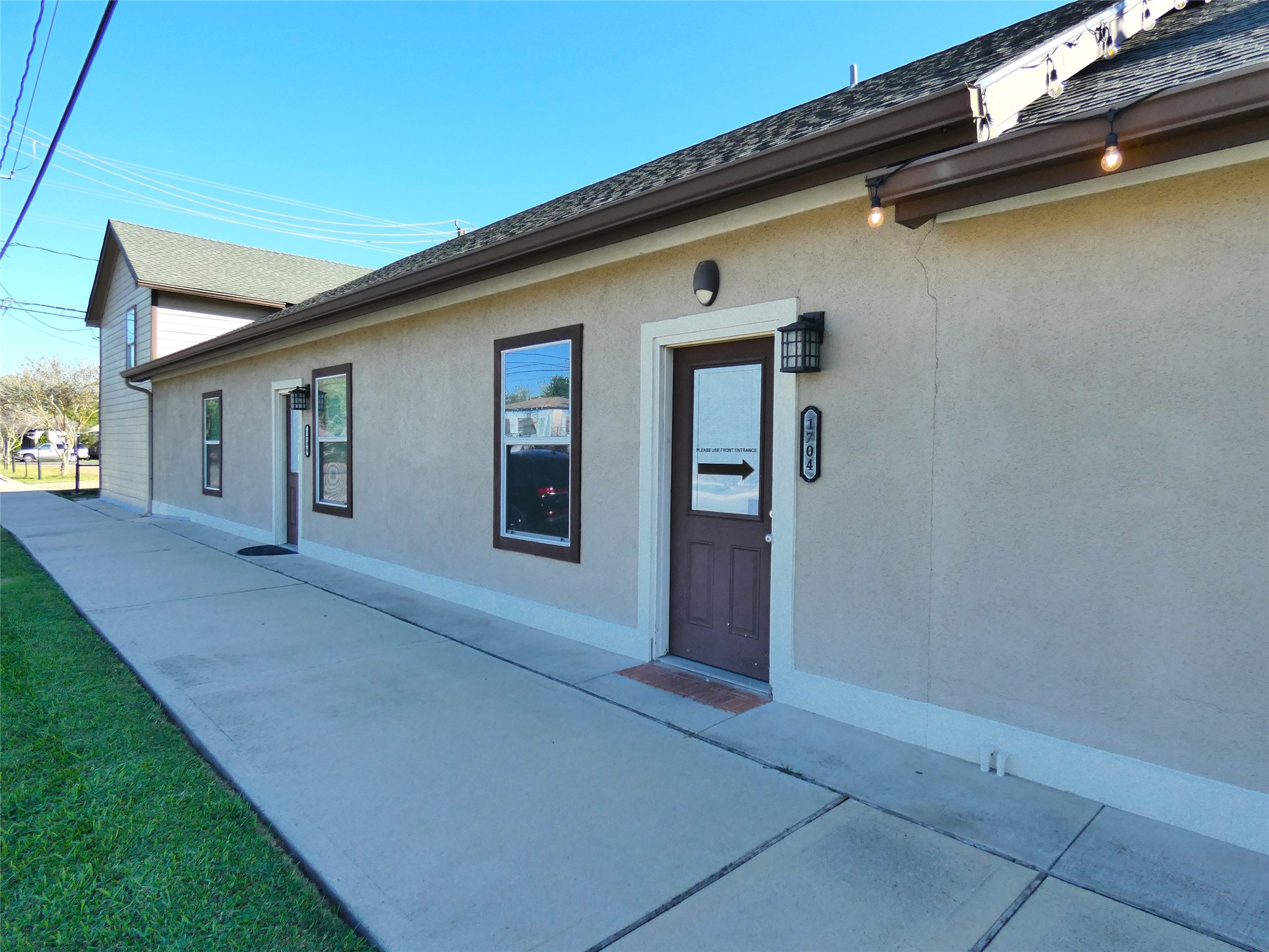 1704 Avenue D Rosenberg, TX 77471 - Photo 3 of 27 a view of a house with backyard and parking