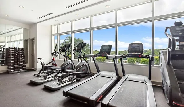 a view of a room with gym equipment
