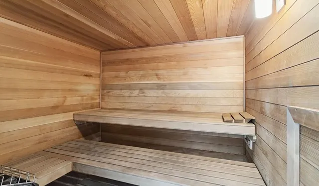 a bathroom with a bathtub and shower