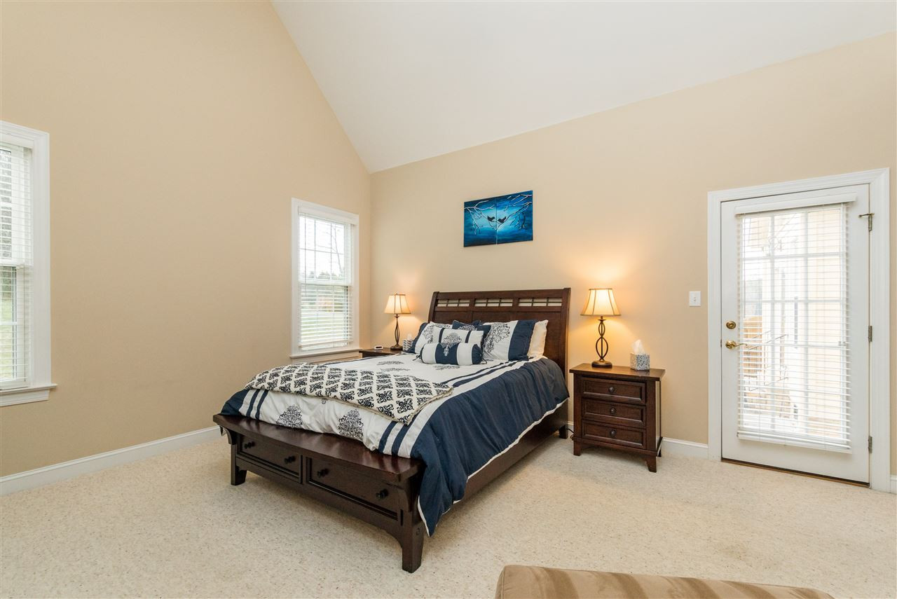 107 Austin Pond Road Clayton, NC 27520 - Photo 12 of 24 Large master with door to patio