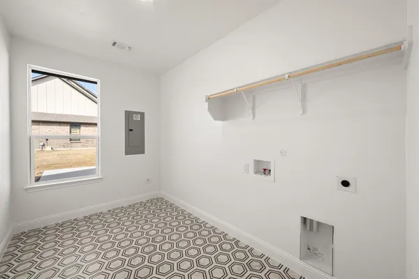 a spacious bathroom with a tub and shower