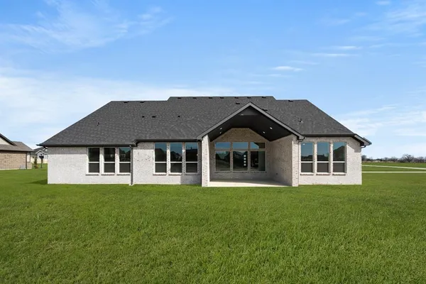 a house view with a garden space