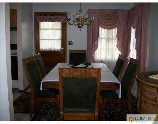 32 Overhill Road Matawan, NJ 07747 - Photo 3 of 8 a view of a dining room with furniture and window