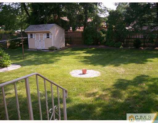 32 Overhill Road Matawan, NJ 07747 - Photo 8 of 8 a view of a house with backyard and sitting area
