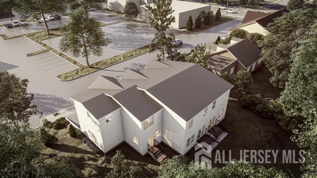 16 Moyse Place Edison, NJ 08820 - Photo 3 of 5 an aerial view of a house with a yard