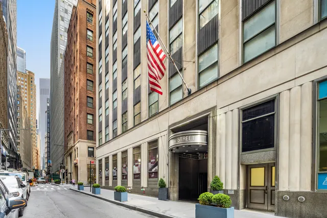 a view of a building on a street