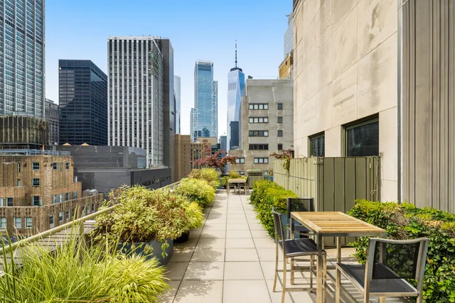 a view of balcony with outdoor seating