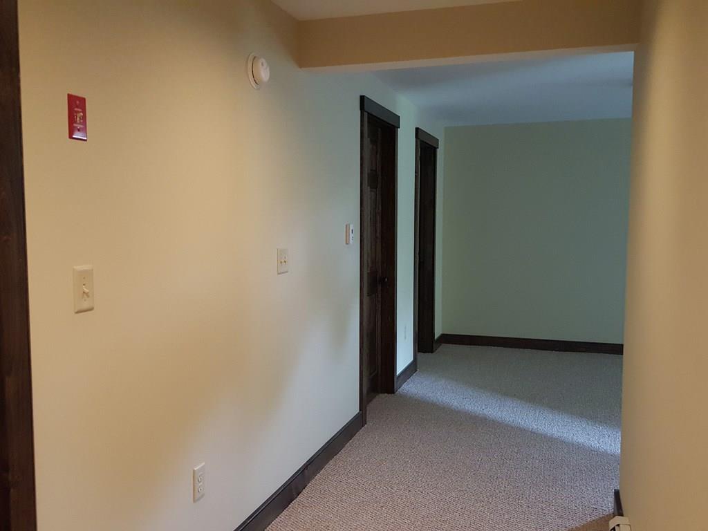 71 Paradise Road Bethel, ME 04217 - Photo 27 of 30 Hall at the bottom of the basement...