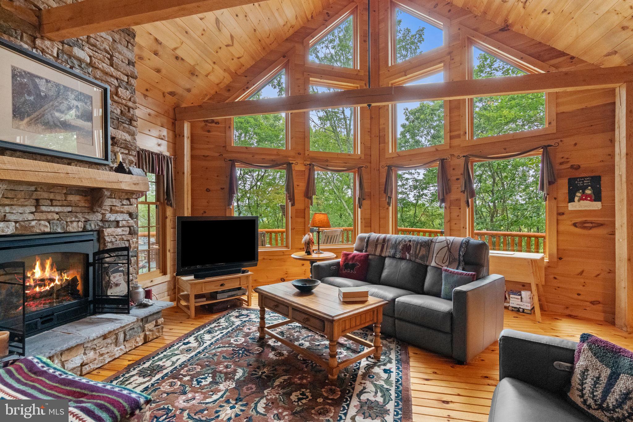 114 Summit Road Hazleton, PA 18202 - Photo 19 of 66 wall of windows and vaulted ceiling in LR