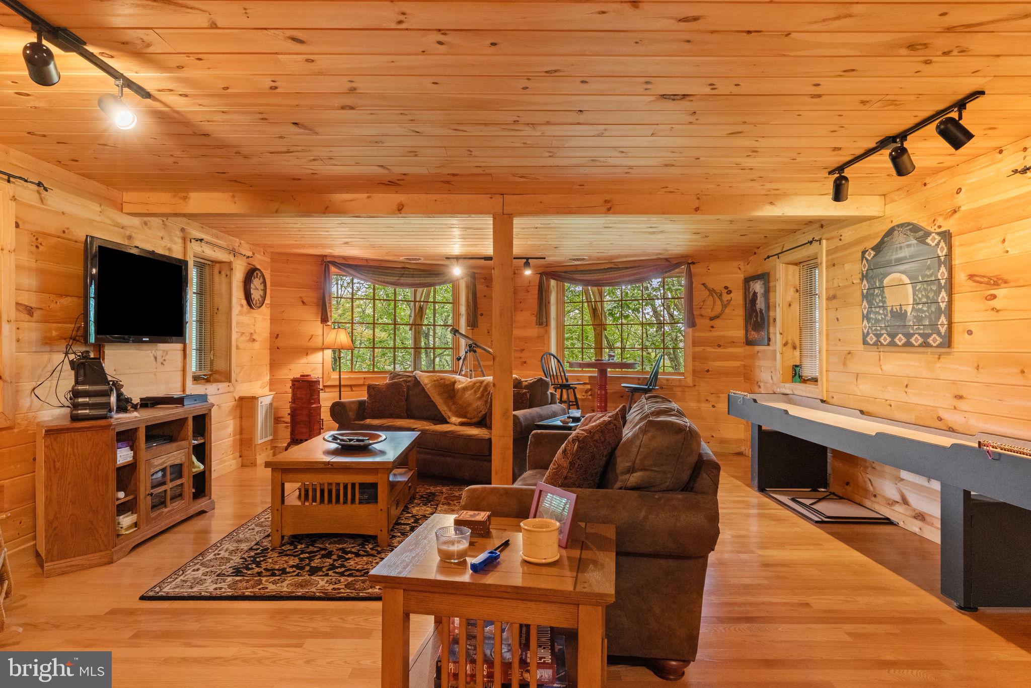 114 Summit Road Hazleton, PA 18202 - Photo 23 of 66 lower level family room with shuffle board