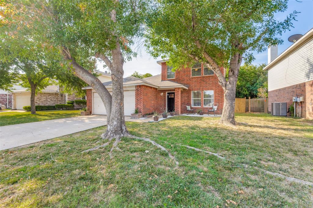 1224 Rambling Brook Trail Denton, TX 76210 - Photo 1 of 1 a view of a house with a yard