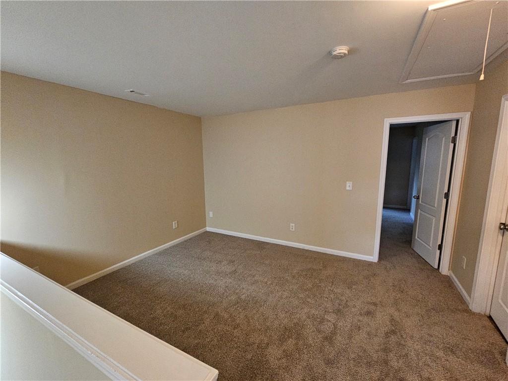 2160 Spikerush Way Buford, GA 30519 - Photo 14 of 29 a view of an empty room
