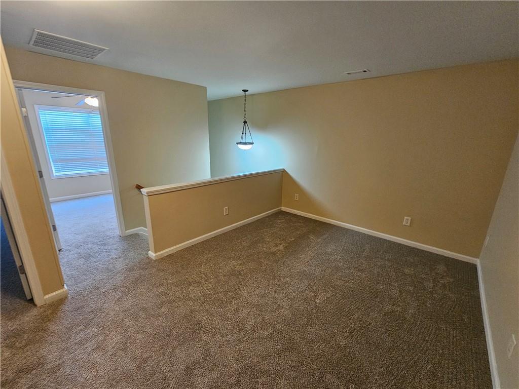 2160 Spikerush Way Buford, GA 30519 - Photo 19 of 29 a view of an empty room