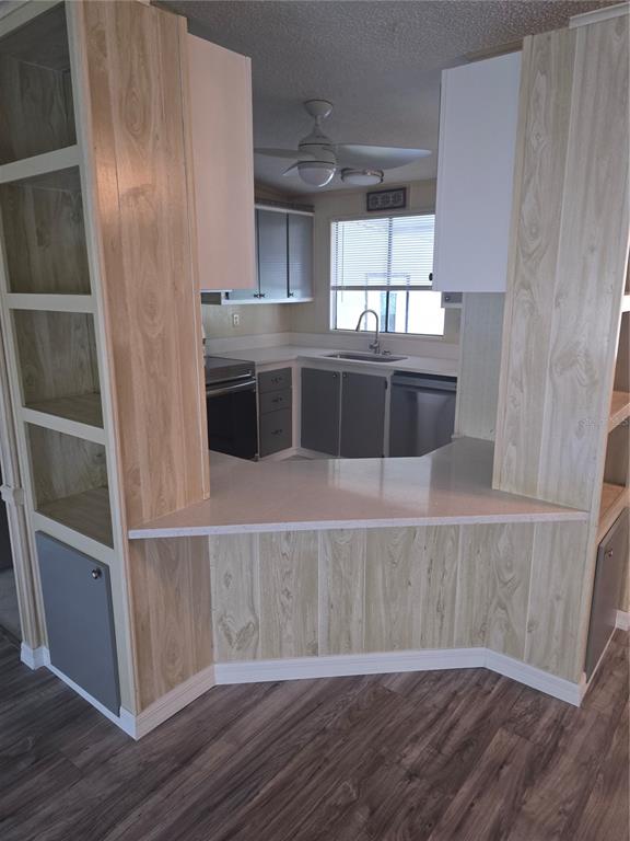 1705 Kiley Court The Villages, FL 32159 - Photo 4 of 20 a view of an empty room with wooden floor and a window