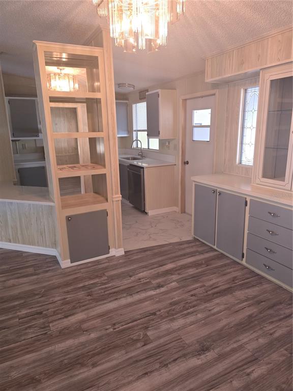 1705 Kiley Court The Villages, FL 32159 - Photo 5 of 20 a view of a kitchen counter space and wooden floor