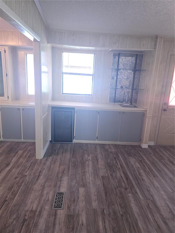 1705 Kiley Court The Villages, FL 32159 - Photo 6 of 20 a room with wooden floors and window