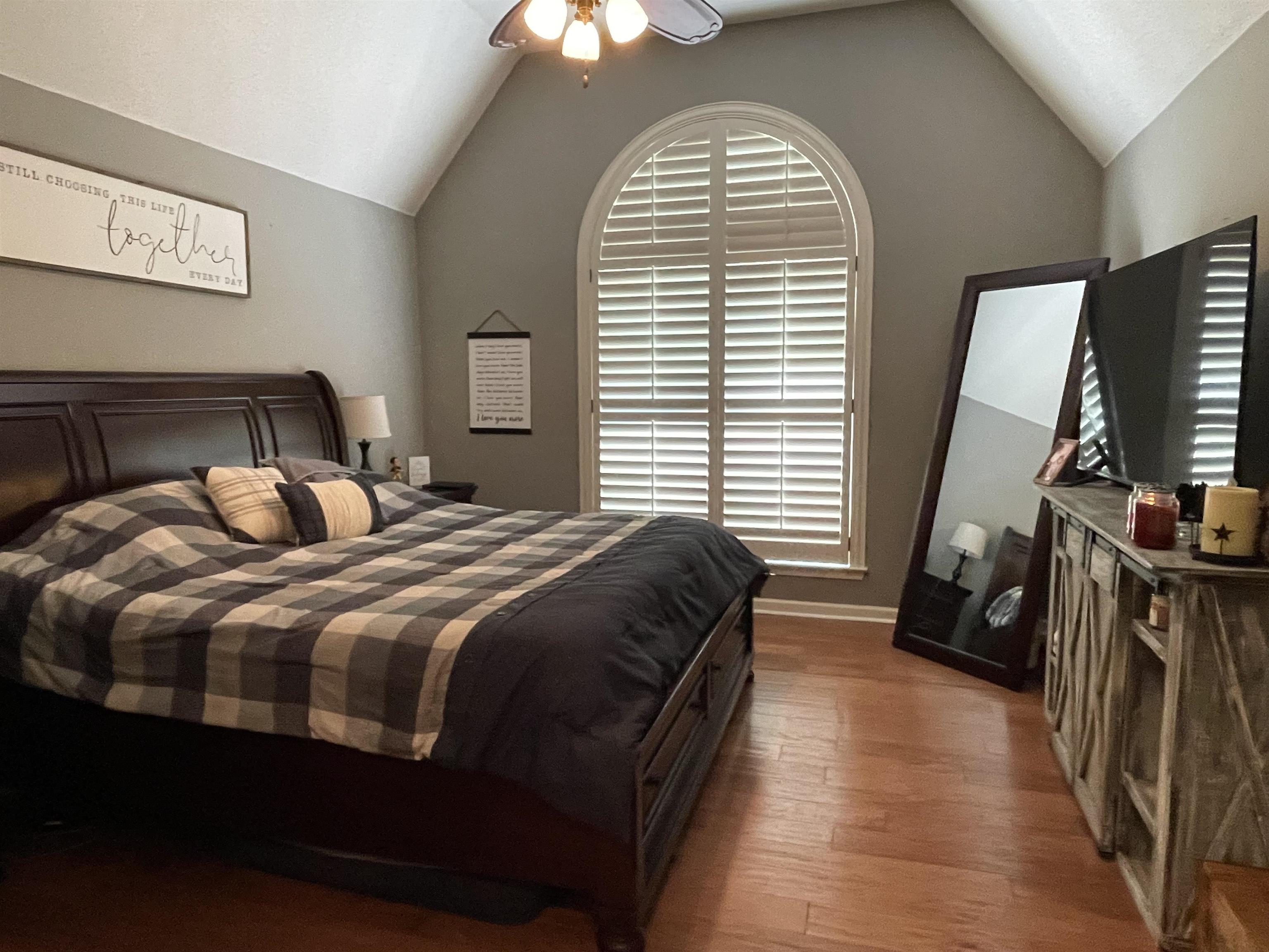 60 Mulberry Cove Oakland, TN 38060 - Photo 11 of 20 a bedroom with bed and wooden floor