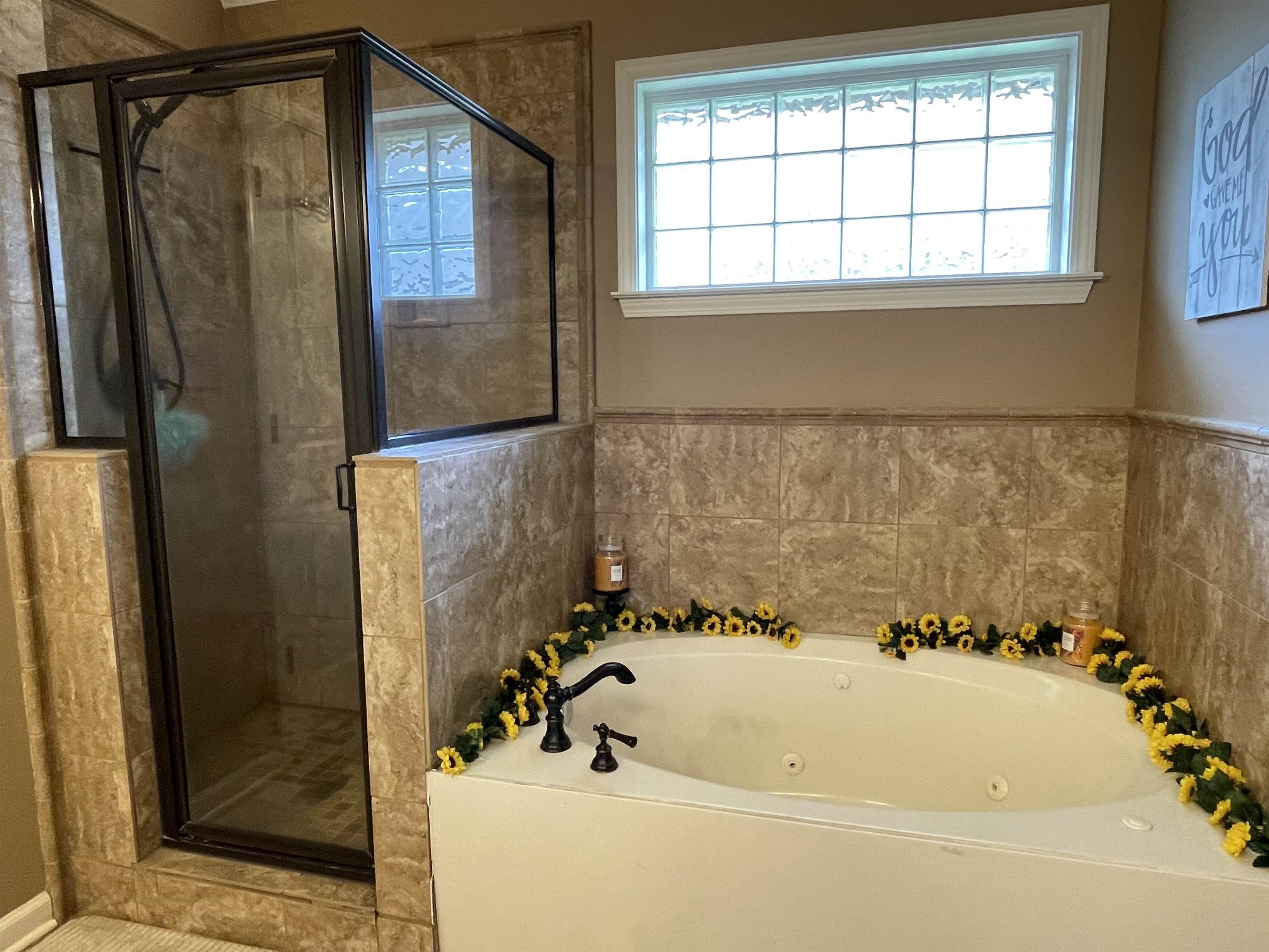 60 Mulberry Cove Oakland, TN 38060 - Photo 12 of 20 a bathroom with a bathtub and shower