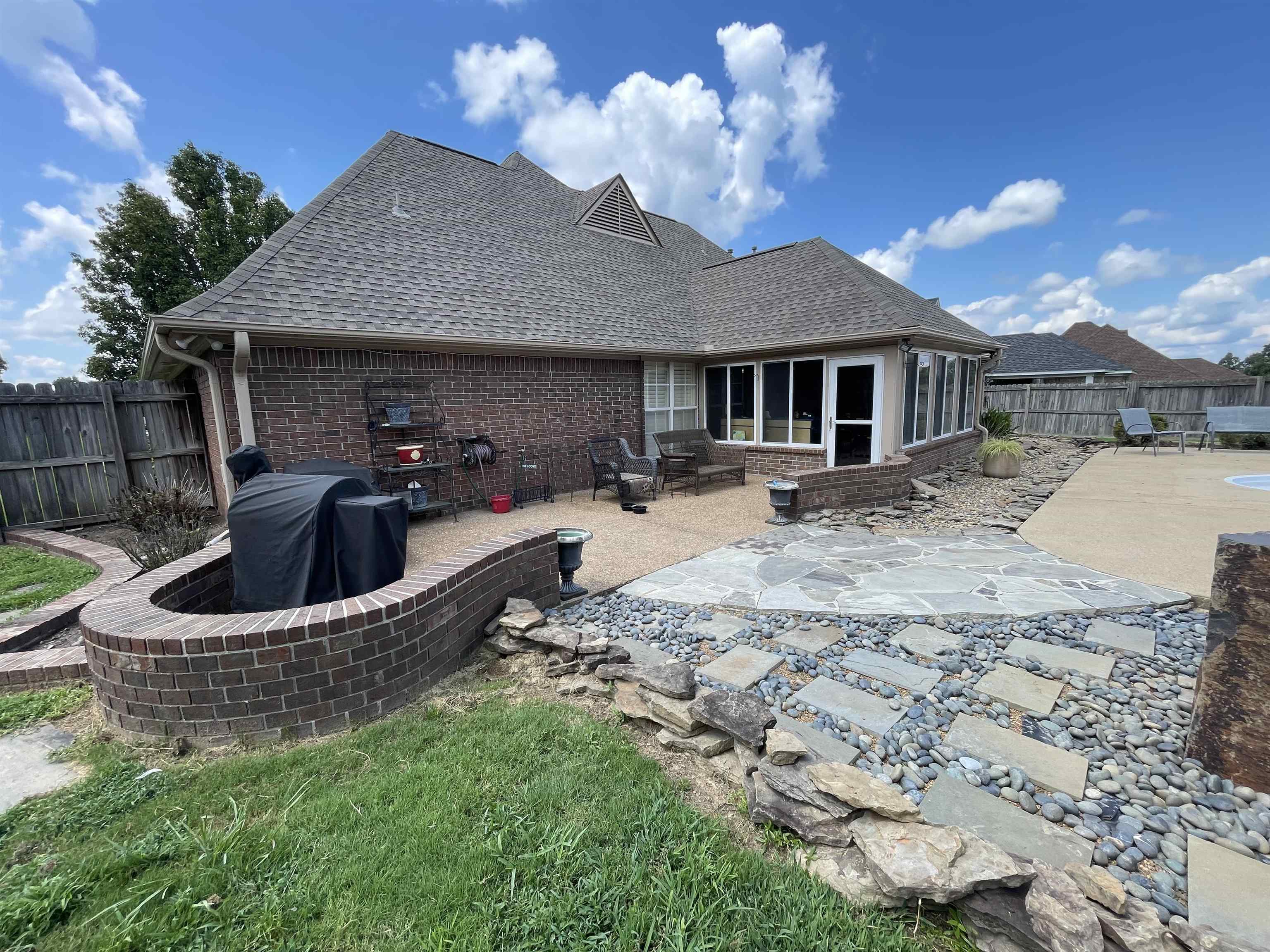 60 Mulberry Cove Oakland, TN 38060 - Photo 17 of 20 a front view of a house with garden