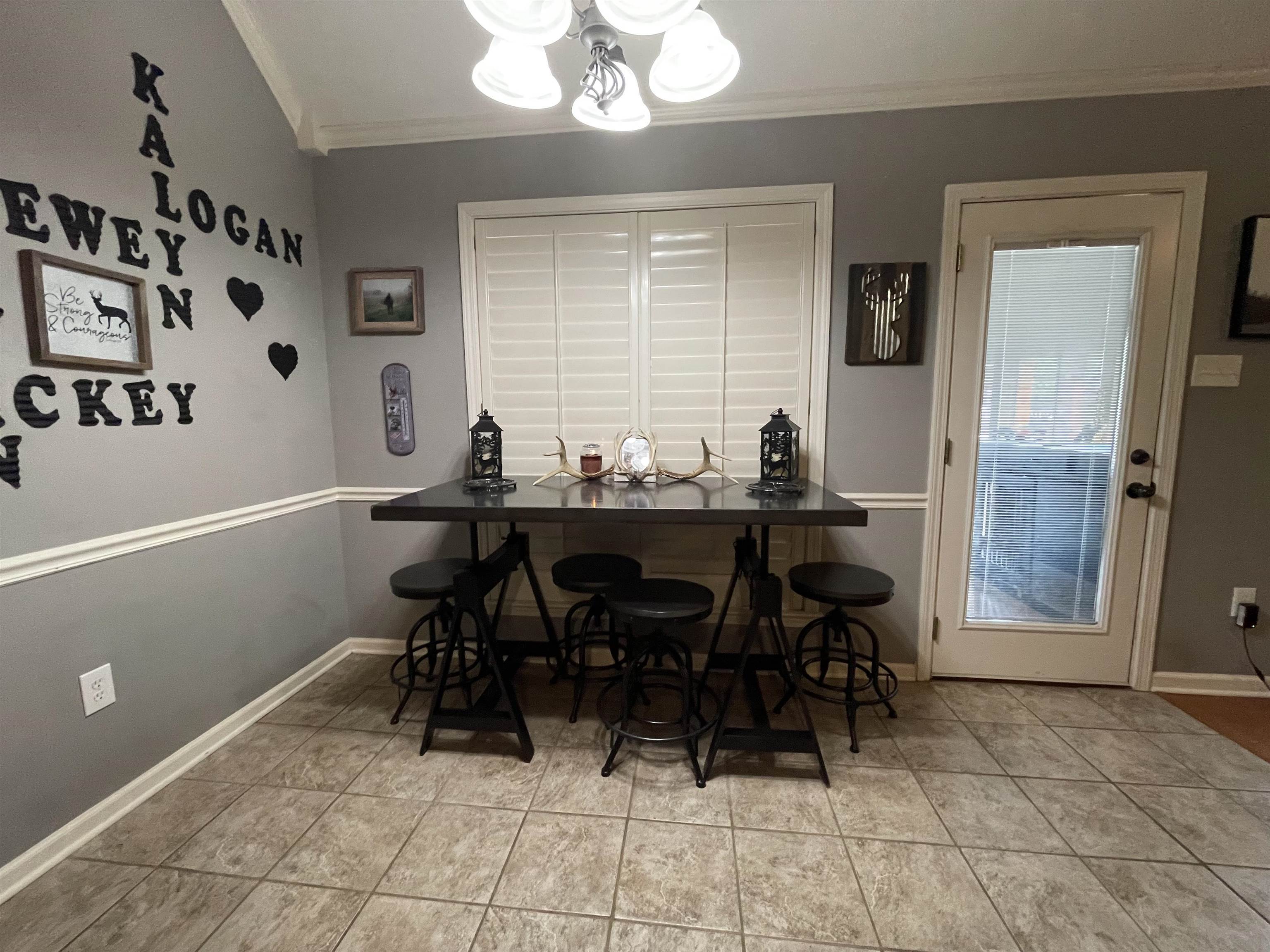 60 Mulberry Cove Oakland, TN 38060 - Photo 7 of 20 a view of a dining room with furniture and chandelier