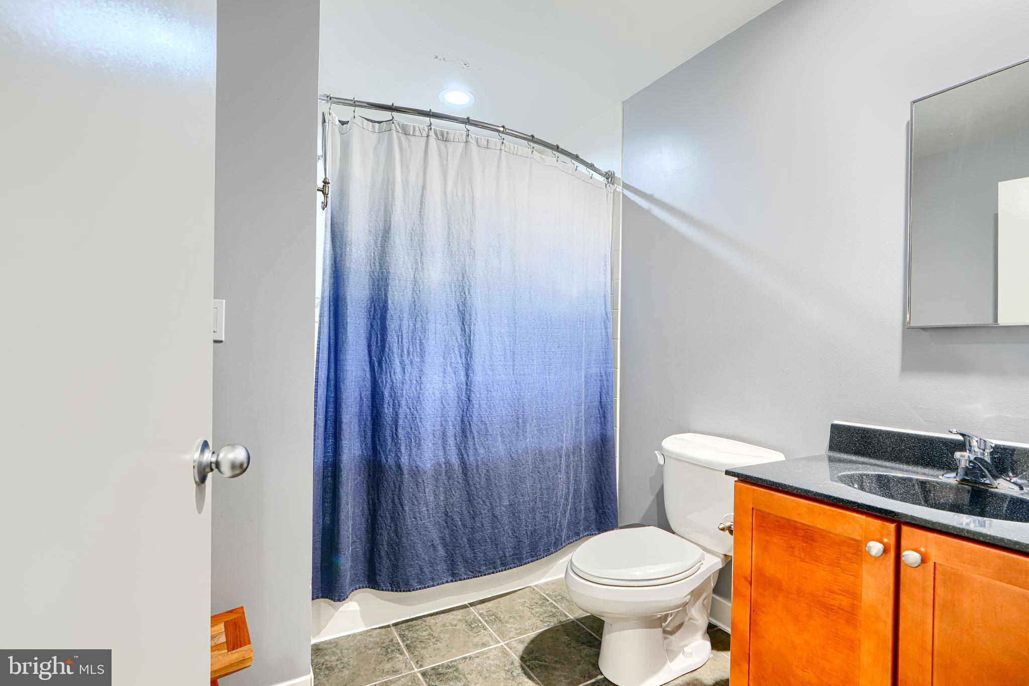 1211 Light Street, Unit T8 Baltimore, MD 21230 - Photo 17 of 33 a bathroom with a toilet and a sink