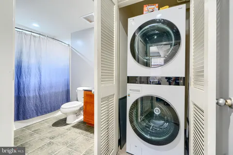 a bathroom with a toilet and a sink