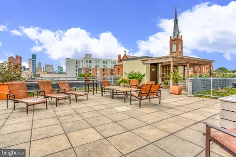 a view of a terrace with furniture