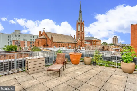 a view of a swimming pool with a lounge chairs