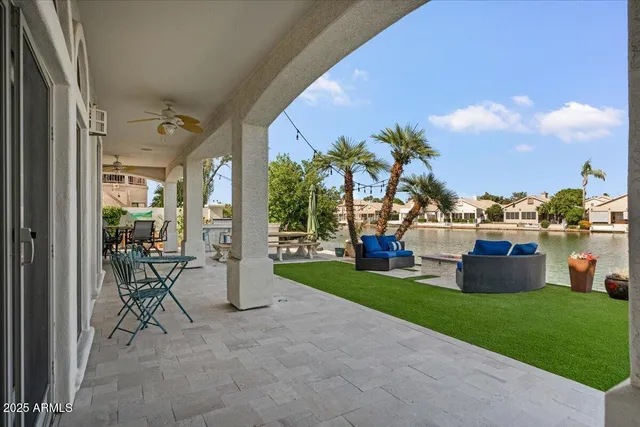 a work room with furniture and potted plants