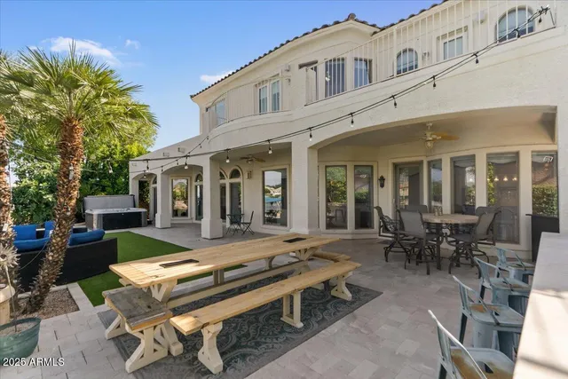a view of a bathroom with tub and window