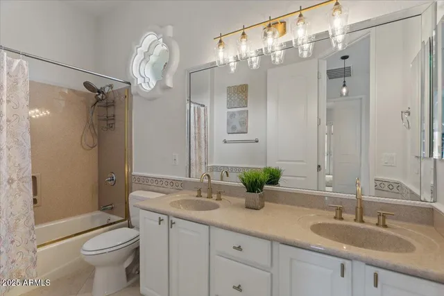 an aerial view of a city with ocean view