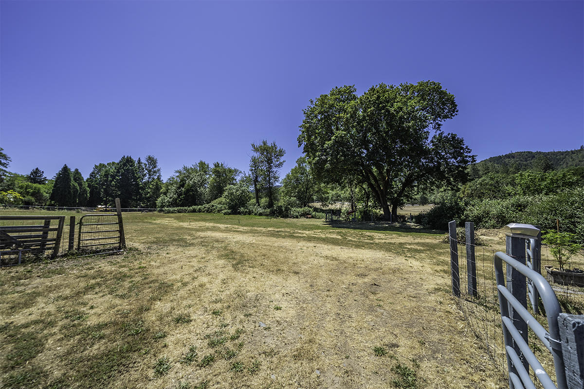 7785 Old Stage Road Central Point, OR 97502 - Photo 12 of 47 a view of backyard with green space