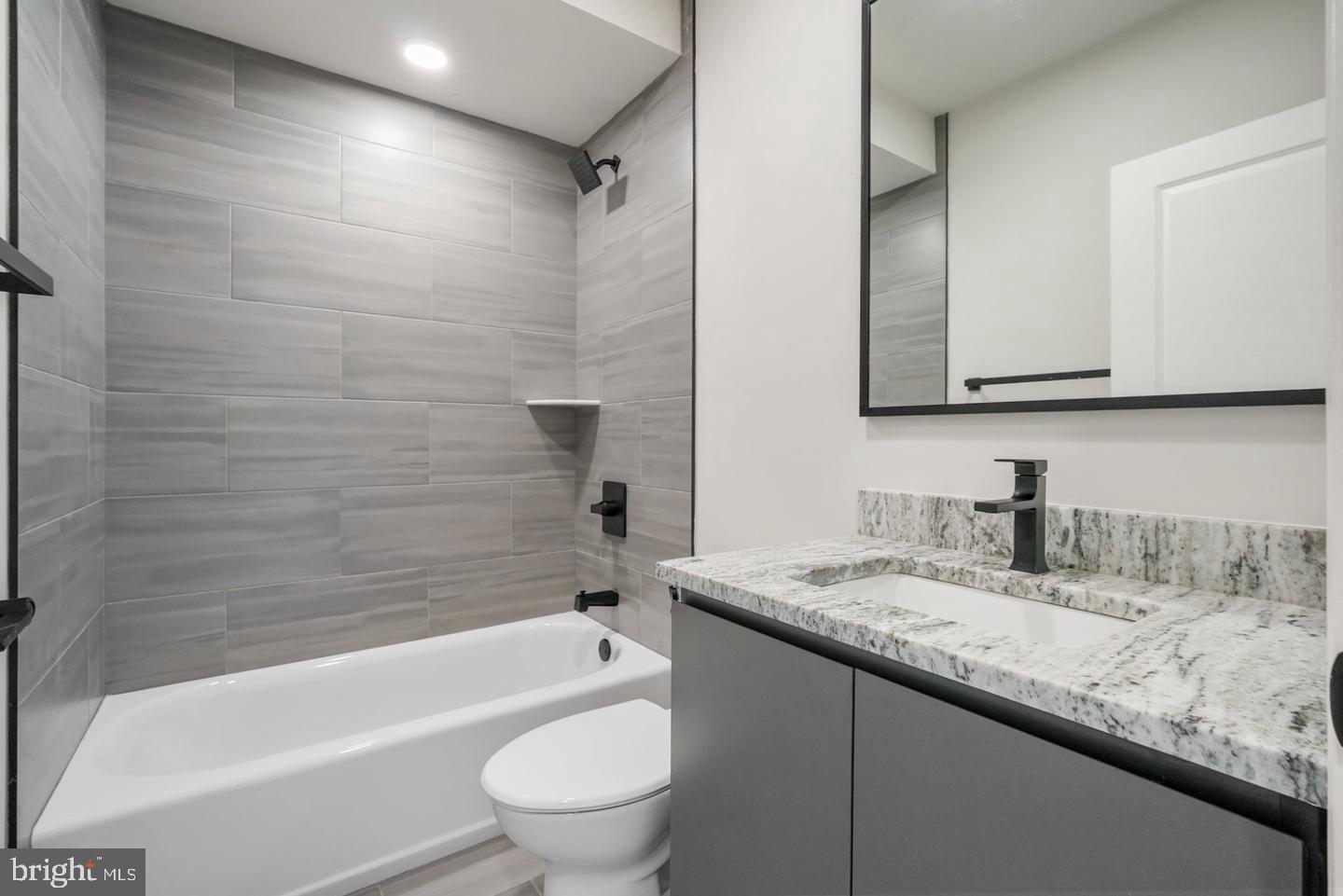 2709 Priya, Unit A76 Philadelphia, PA 19131 - Photo 21 of 29 Sleek modern bathroom retreat.