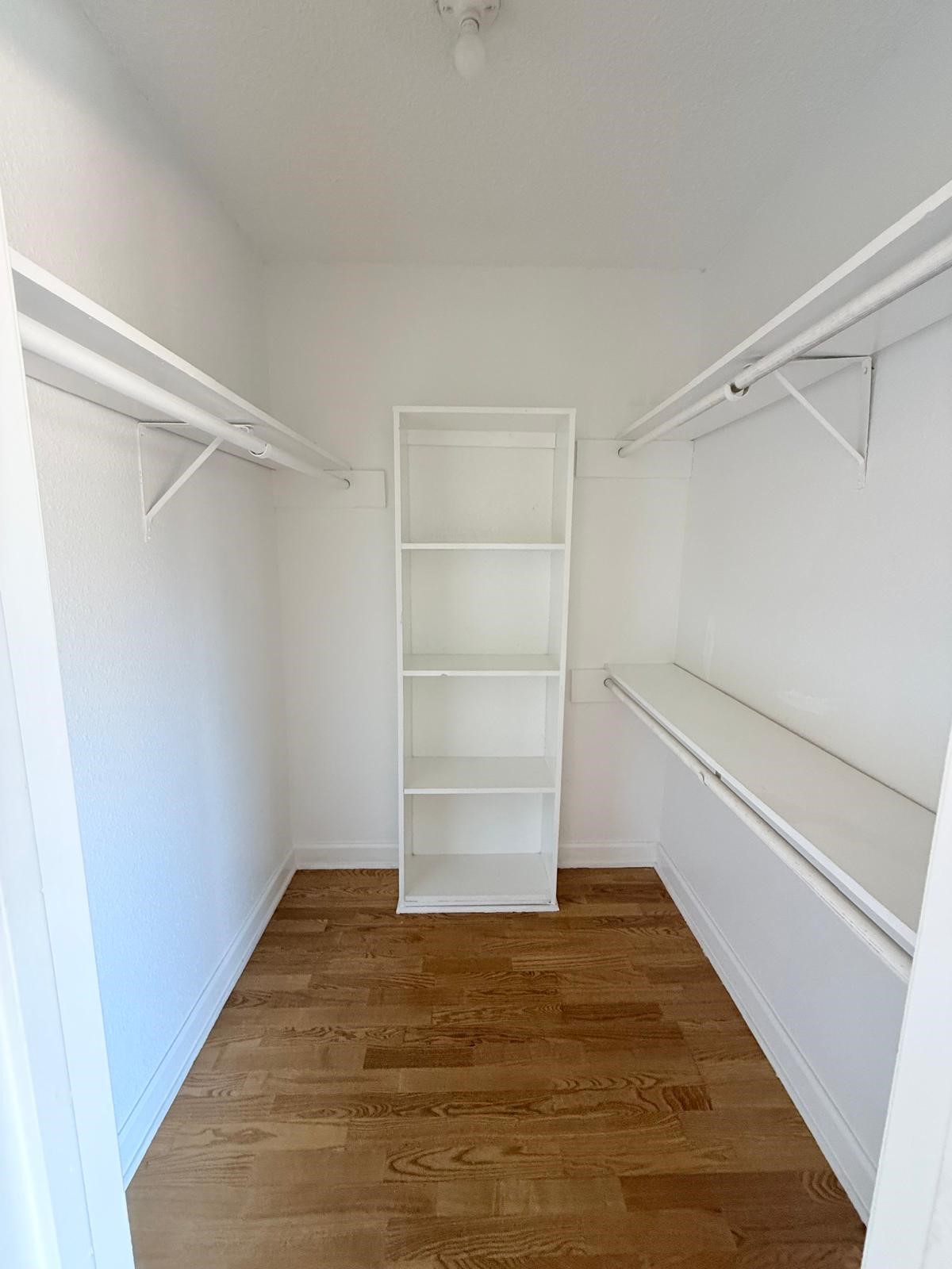 8287 Sands Point Drive, Unit 128 Houston, TX 77036 - Photo 14 of 30 a view of an empty walk in closet