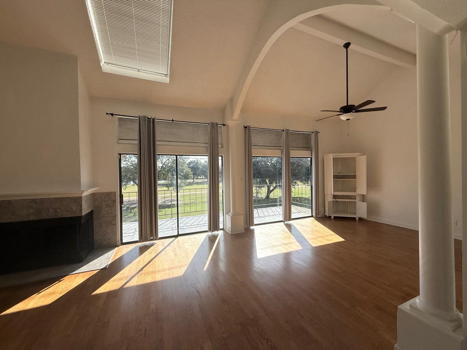 8287 Sands Point Drive, Unit 128 Houston, TX 77036 - Photo 15 of 30 a view of a room with wooden floor and a window