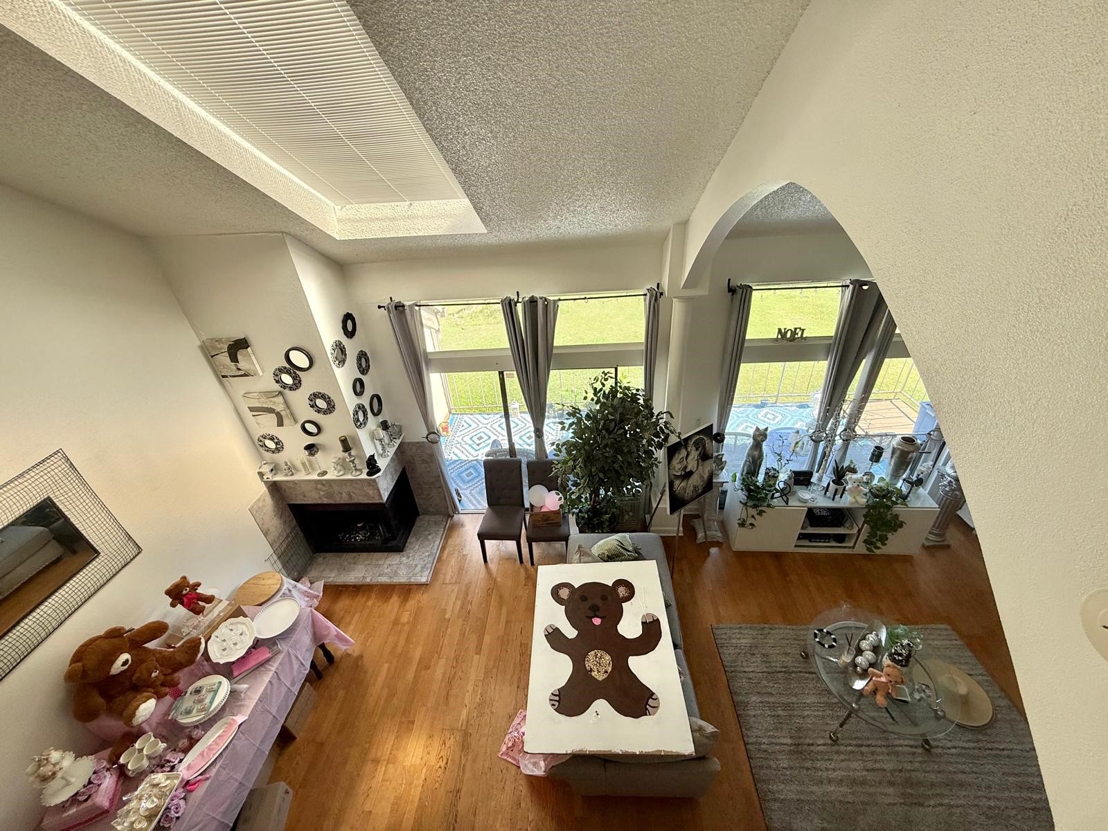 8287 Sands Point Drive, Unit 182 Houston, TX 77036 - Photo 2 of 8 a living room with furniture and a large window