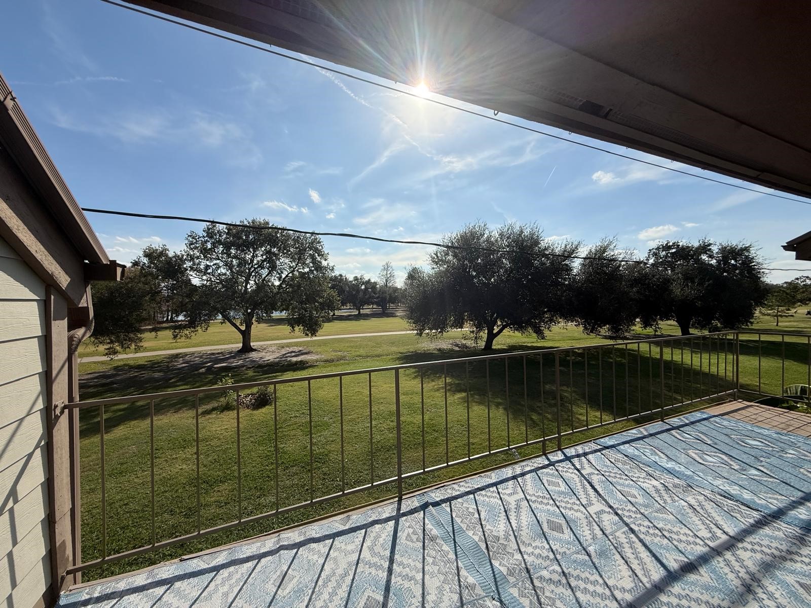 8287 Sands Point Drive, Unit 128 Houston, TX 77036 - Photo 23 of 30 a view of a lake from a balcony