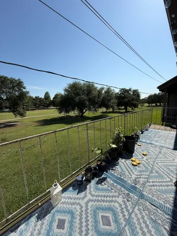 a view of a terrace with a bench