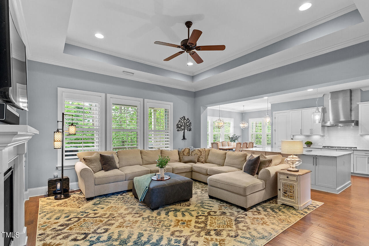 5273 Aleppo Lane Raleigh, NC 27613 - Photo 14 of 56 a living room with furniture and a large window