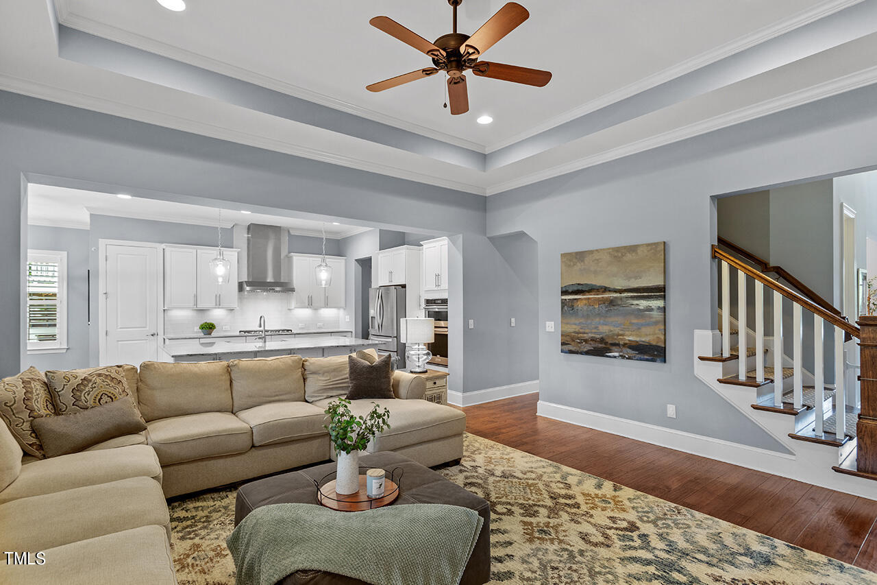 5273 Aleppo Lane Raleigh, NC 27613 - Photo 18 of 56 a living room with furniture kitchen view and a window