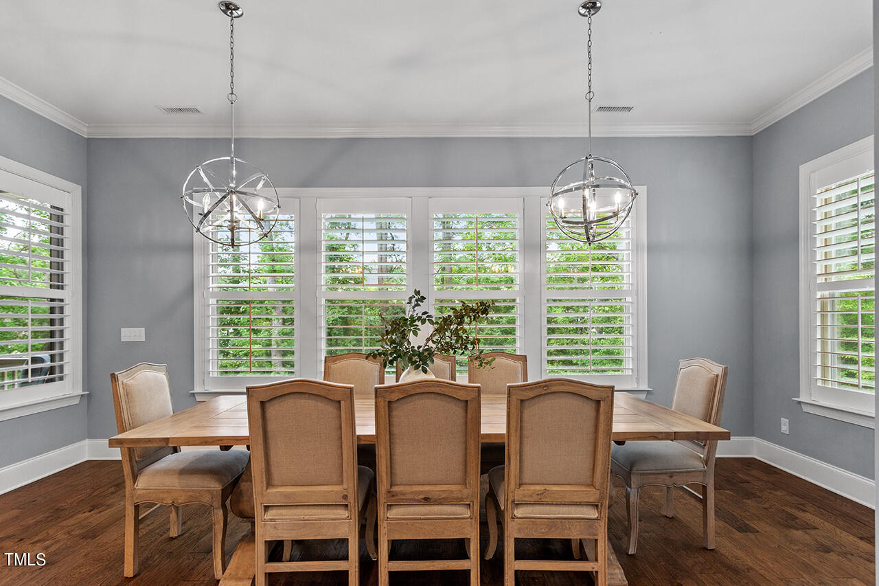 5273 Aleppo Lane Raleigh, NC 27613 - Photo 25 of 56 a view of a dining room with furniture window and outside view